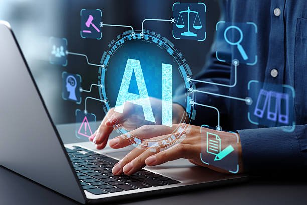 Hands typing on a laptop representing AI compliance and legal readiness in UAE